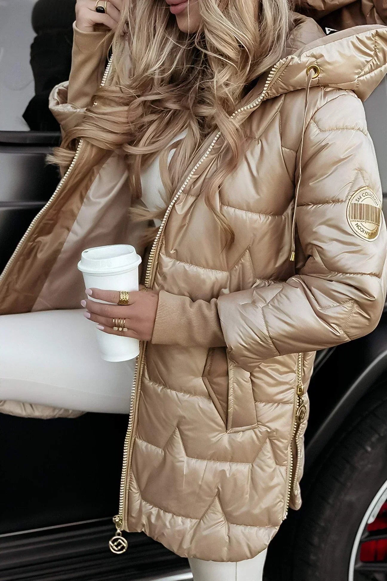 Zéphirine | Lange und warme Steppjacke mit umschlagbarer Kapuze